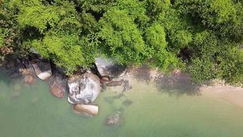 Aerial view rock at beach in hot day video