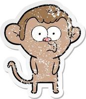 distressed sticker of a cartoon hooting monkey vector