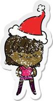 annoyed distressed sticker cartoon of a girl wearing santa hat vector