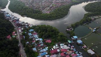 Aerial move towards Batu Kawan fishing village. video