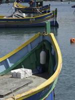 Marsaxlokk harbor on malta island photo