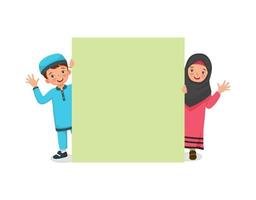 happy Muslim kids little boy and girl peeking from behind blank billboard smiling and waving hands showing copyspace for advertising and announcement messages vector