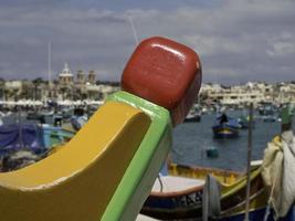 Marsaxlokk harbor on malta island photo