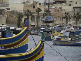 Marsaxlokk harbor on malta island photo