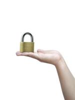 Metal padlock in hand isolated on white background photo