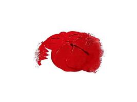 Red brush stroke isolated over white background photo