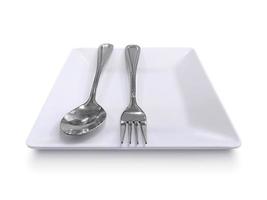 Spoon, fork and plate isolated on white background photo