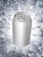 Aluminum cans on a Ice broken splash background photo