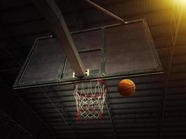 Basketball basket with all going through net photo