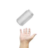 Soft drink cans and men's hand on white background. photo