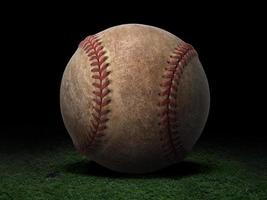 baseball ball on black background photo