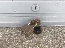 Old padlock. lock on iron door photo