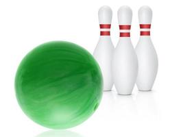 Bowling ball and skittles isolated on white background photo