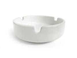 White ceramic ashtray on white background photo