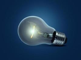 light bulb on blue background photo