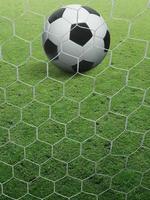 Close-up soccer ball on green grass photo