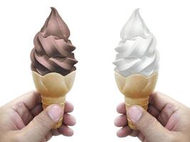 A man hand holding an ice cream cone on a white background photo