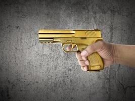 Killer with gun close up over grunge background with copyspace photo