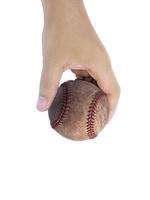 Baseball in hand on white background photo