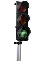 Green traffic light isolated on white background photo