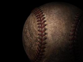 pelota de béisbol sobre fondo negro foto