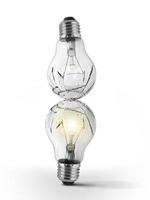 Broken bulb, isolated white background photo