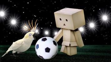 Paper puppet playing ball with a cockatoo bird in a football stadium video