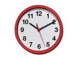 reloj de pared redondo sobre fondo blanco foto