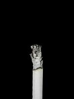 The cigarette isolated on a white background photo