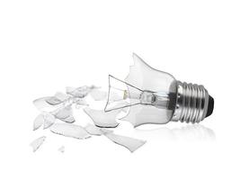 Broken light bulb isolated on white background photo