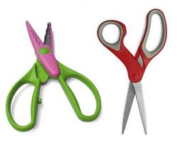 plastic open scissors and Red scissors isolated on a white background photo