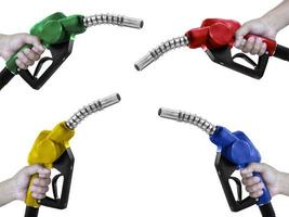 Hands holding Fuel. nozzle with hose isolated on white background photo