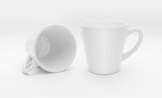 White cup of coffee on the white background photo