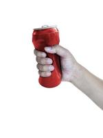 Compressed cans in hand isolated on white background photo