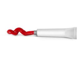 Red paint tin tube squeezed on white background isolated photo