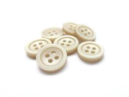 clothing buttons on white background photo