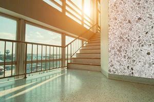 background image of building stairs during sunset photo