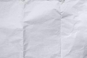 textura de papel rugoso para el fondo. papel blanco rayado arrugado con una textura detallada. primer plano de papel de acuarela. foto