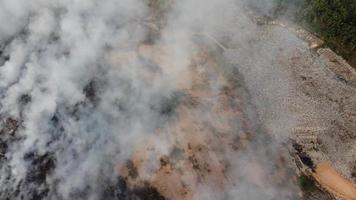 Aerial view burning at landfill site video