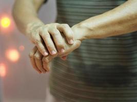 woman holding hands rare disorder body immune system attacks nerves, Guillan Barre Syndrome, Vaccine covid-19 coronavirus Treatment photo