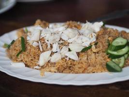Crab meat fried rice on white plate, Thai food photo