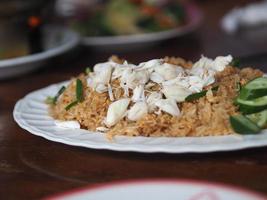 Crab meat fried rice on white plate, Thai food photo