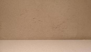 Brown marble stone wall and floor rough surface texture material background for display photo