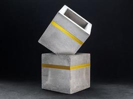 Modern cubic concrete planter. Painted concrete pot for home decoration photo