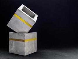 Modern cubic concrete planter. Painted concrete pot for home decoration photo