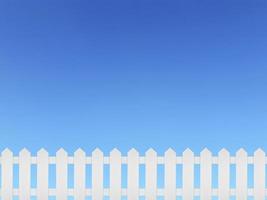 White wooden fence and on a clear blue sky background photo