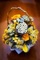 Dried floral bouquet in a basket photo