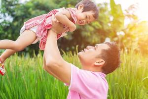 Piggyback of baby and dad photo