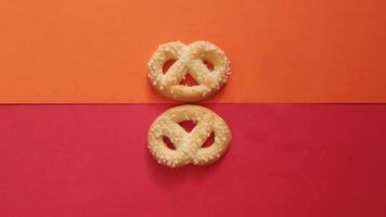 shapes of cookies in stack on red background photo