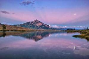 MT Crested Butte with reflection during blue hour in fall season of Colorado, USA photo